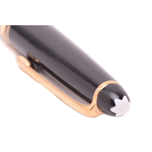 362 - A silver Montegrappa ballpoint pen with engraved decoration, with Italian and English control marks,... 