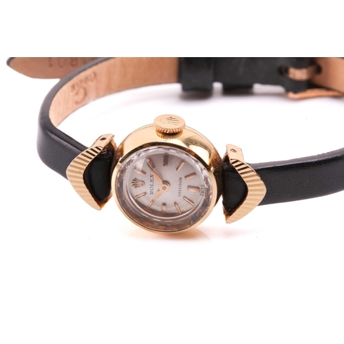 366 - A Rolex Precision yellow metal manual wind ladies wristwatch, the silvered textured dial having batt... 