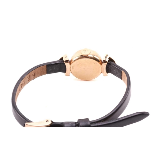 366 - A Rolex Precision yellow metal manual wind ladies wristwatch, the silvered textured dial having batt... 