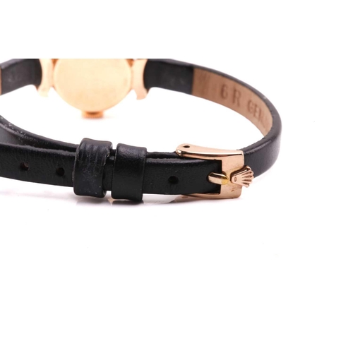 366 - A Rolex Precision yellow metal manual wind ladies wristwatch, the silvered textured dial having batt... 