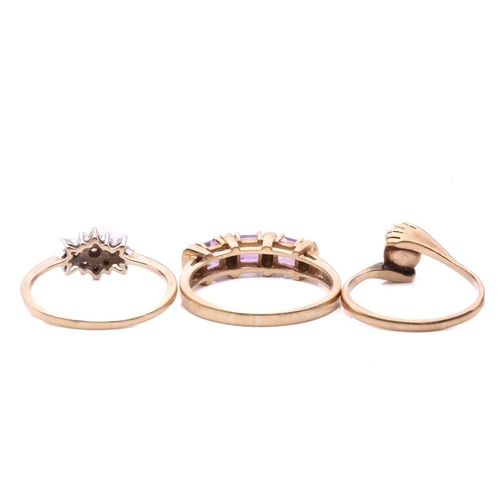 37 - Three gem-set rings; the diamond cluster ring set with round brilliant cut diamonds with a total est... 