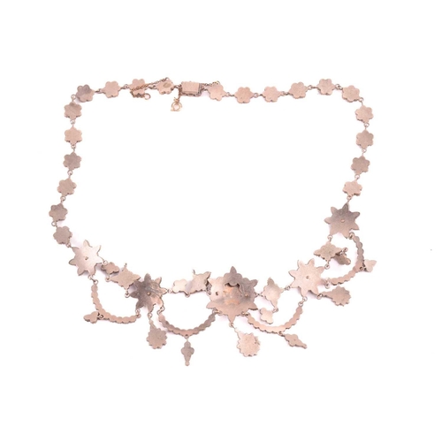 38 - A Victorian Bohemian garnet necklace, set with clusters and swags of garnets, with a length of 47cm,... 