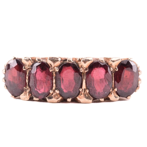 38 - A Victorian Bohemian garnet necklace, set with clusters and swags of garnets, with a length of 47cm,... 