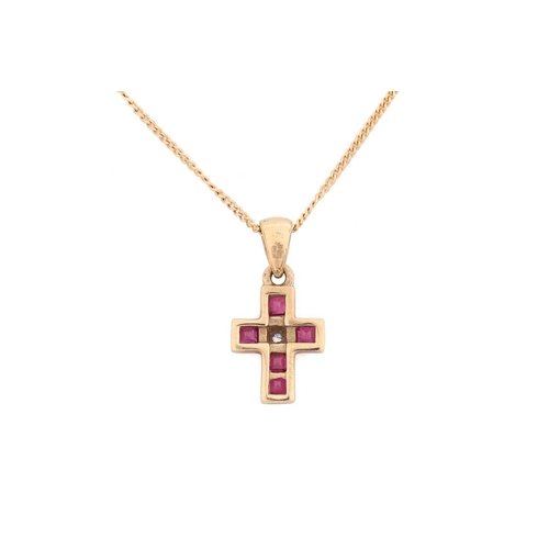 39 - A diamond solitaire ring and a gem-set cross on chain; the ring contains a brilliant-cut diamond in ... 