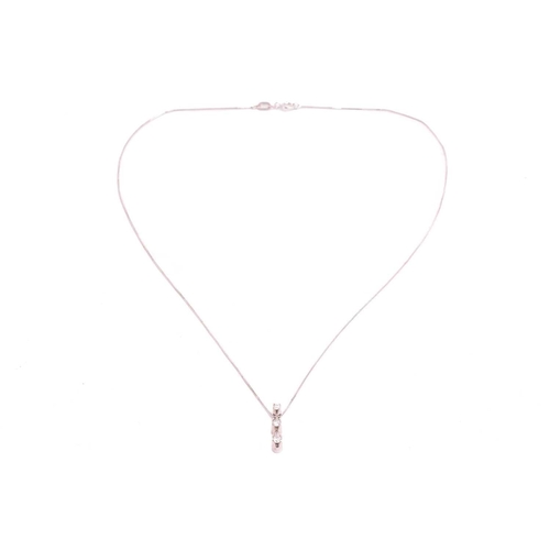 42 - An opal dress ring in 9ct gold and a diamond pendant on chain; the ring contains an oval cabochon of... 
