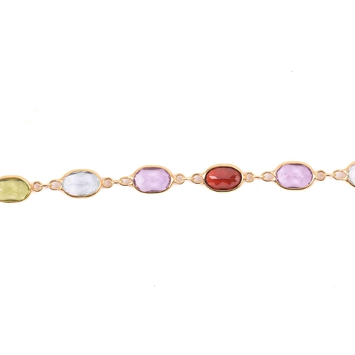 45 - A gem-set harlequin necklace, open-back links set with oval-cut gemstones of 5.8 mm, alternating wit... 
