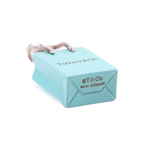 48 - Tiffany & Co. - a shopping bag charm with Tiffany Blue enamel finish, signed and marked 'AG 925 Germ... 