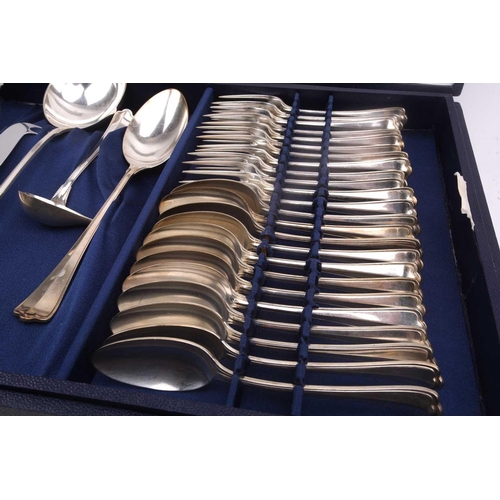 483 - An Italian white metal 800 standard canteen, comprising a bread knife, a serving spoon and fork, a s... 