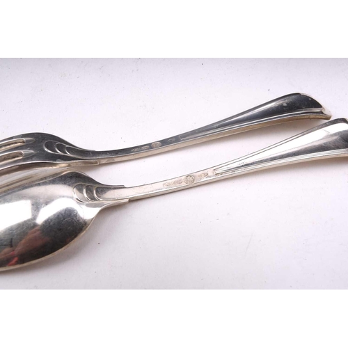 483 - An Italian white metal 800 standard canteen, comprising a bread knife, a serving spoon and fork, a s... 