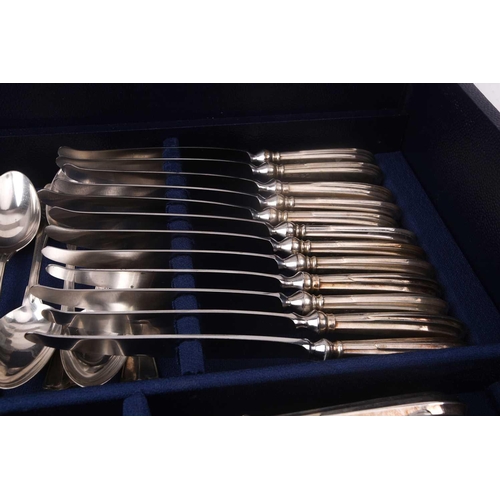 483 - An Italian white metal 800 standard canteen, comprising a bread knife, a serving spoon and fork, a s... 