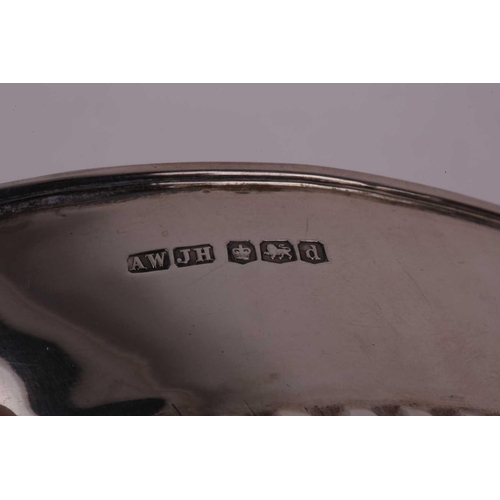 484 - A George IV-style three-piece silver tea set, with makers mark A W | J H, Sheffield 1921, of oval fo... 