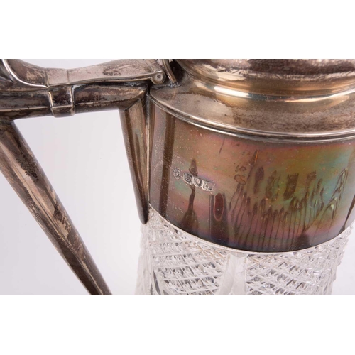 485 - A large late Victorian silver mounted ice water ewer, London 1899 by Barnard Brothers, with removabl... 