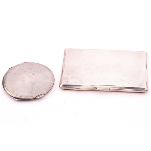 486 - A silver cigarette case, By Inman Manufacturing Co, Birmingham 1942, of rectangular form with engine... 