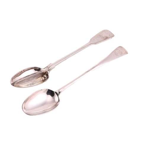 488 - A Victorian silver straining spoon, fiddle and thread pattern, London 1852 by George Adams; together... 