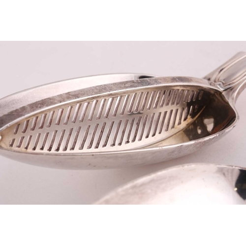 488 - A Victorian silver straining spoon, fiddle and thread pattern, London 1852 by George Adams; together... 