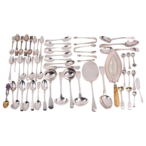 496 - A mixed quantity of silver flatware including a set of six George III tea spoons with bright cut dec... 