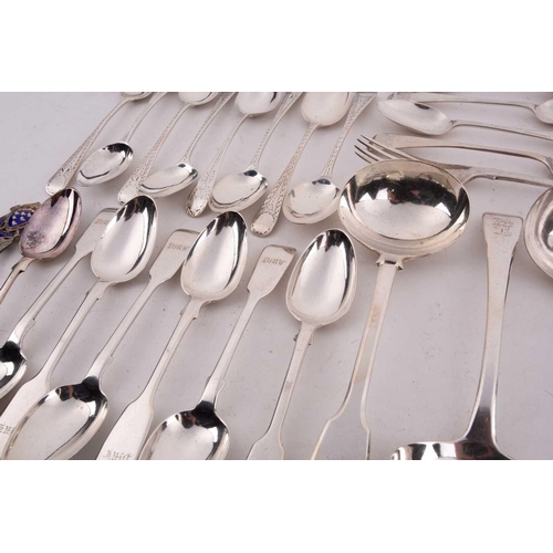 496 - A mixed quantity of silver flatware including a set of six George III tea spoons with bright cut dec... 
