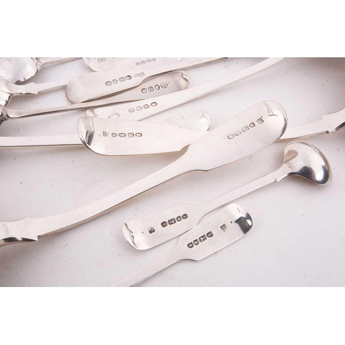 496 - A mixed quantity of silver flatware including a set of six George III tea spoons with bright cut dec... 