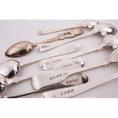 496 - A mixed quantity of silver flatware including a set of six George III tea spoons with bright cut dec... 