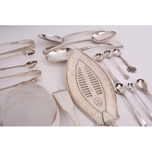 496 - A mixed quantity of silver flatware including a set of six George III tea spoons with bright cut dec... 