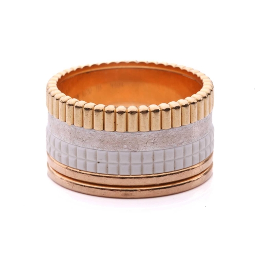 50 - Boucheron - a 'Quatre' white edition large ring in 18ct gold, edged with ribbed yellow gold and thre... 
