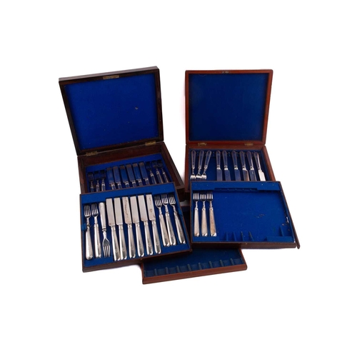 500 - A Victorian silver set of eighteen silver fruit knives and forks, the weighted handles engraved with... 