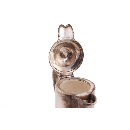502 - A Victorian silver mounted claret jug; the domed cover with ball finial; leaf- capped scroll handle ... 
