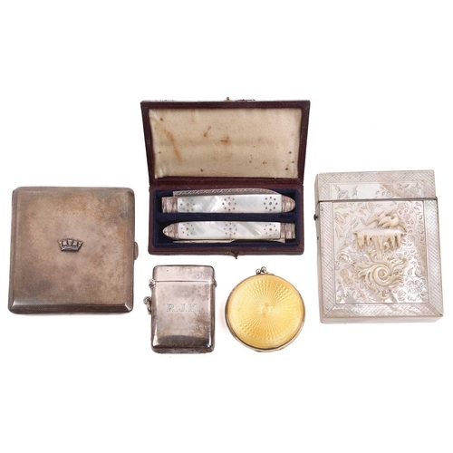 503 - A carved mother of pearl card case, a silver and guillché enamel compact, a naval cigarette case, a ... 