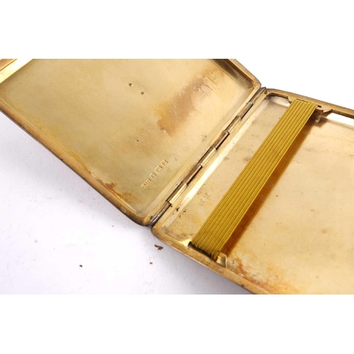 503 - A carved mother of pearl card case, a silver and guillché enamel compact, a naval cigarette case, a ... 
