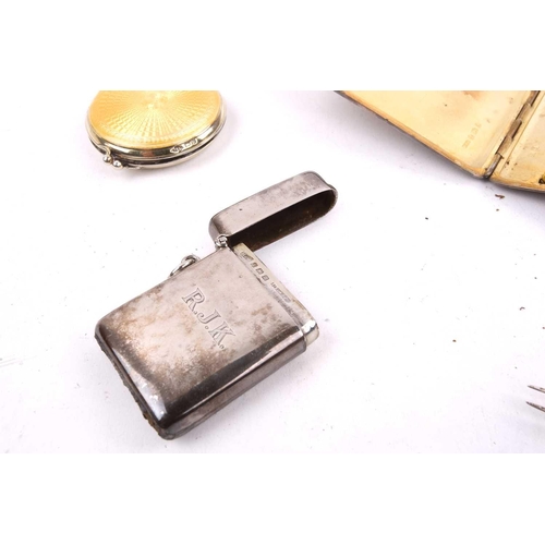 503 - A carved mother of pearl card case, a silver and guillché enamel compact, a naval cigarette case, a ... 