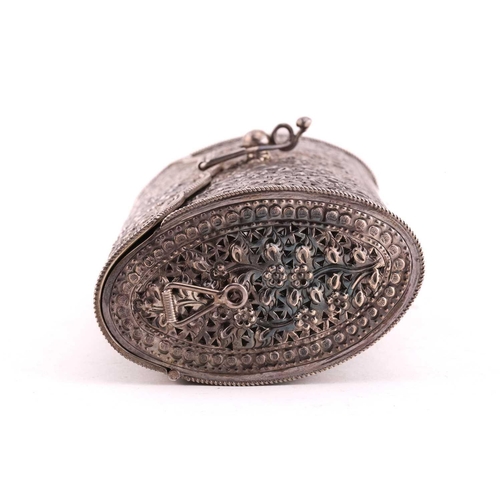504 - A white metal clutch bag; chased and pierced foliate decoration; hinged cover and hinged clasp.Stamp... 
