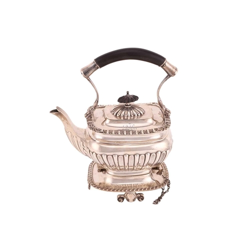 505 - An Edwardian silver teapot and stand, of rectangular gadrooned form with ebony handle, engraved init... 