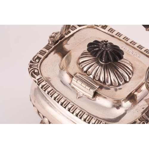 505 - An Edwardian silver teapot and stand, of rectangular gadrooned form with ebony handle, engraved init... 