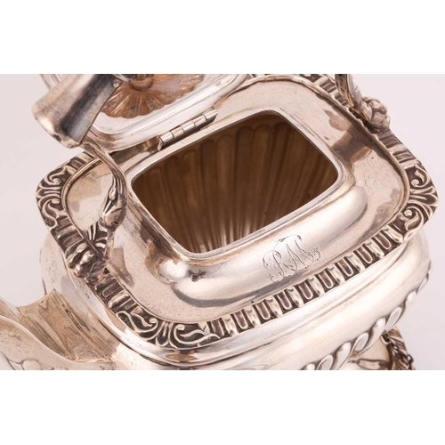 505 - An Edwardian silver teapot and stand, of rectangular gadrooned form with ebony handle, engraved init... 