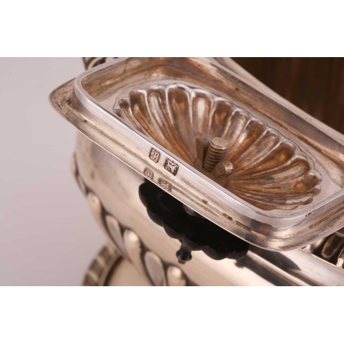 505 - An Edwardian silver teapot and stand, of rectangular gadrooned form with ebony handle, engraved init... 