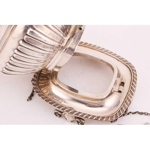 505 - An Edwardian silver teapot and stand, of rectangular gadrooned form with ebony handle, engraved init... 