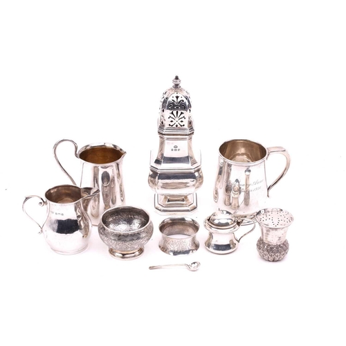 508 - A collection of small silver items comprising a silver square section sugar caster, a silver christe... 
