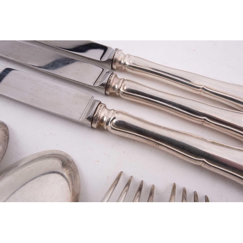 509 - A German set of six white metal 800 standard flatware comprising six spoons, six forks and six knive... 