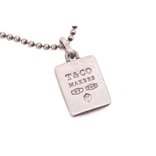 51 - Tiffany & Co. - an '1837 Makers' pendant on ball chain, the rectangular pendant laser engraved with ... 