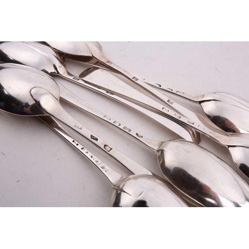 515 - A collection of twelve various silver table spoons, including a George I example by Samuel Hutton, L... 