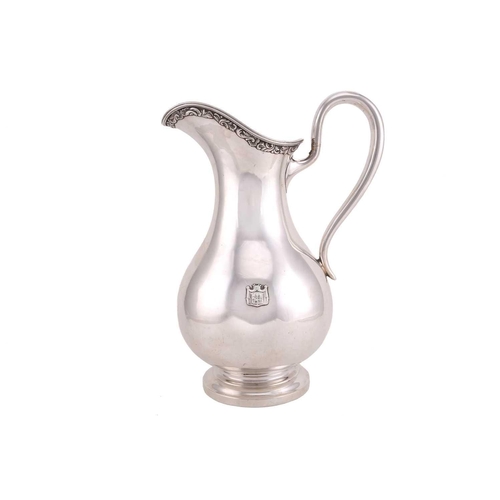 516 - A Russian silver jug, 20th century, probably St Petersburg, with makers mark 'EB', of baluster form,... 
