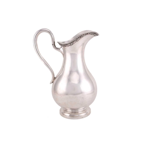 516 - A Russian silver jug, 20th century, probably St Petersburg, with makers mark 'EB', of baluster form,... 