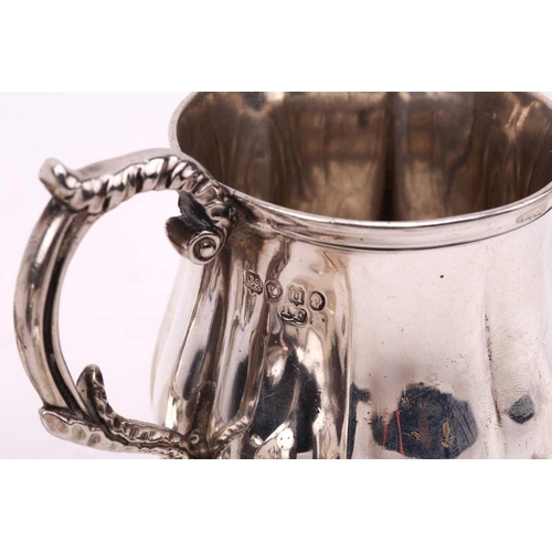 519 - A collection of silver items including silver salt in the form of a bird, a silver mounted pepper mi... 
