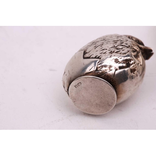 519 - A collection of silver items including silver salt in the form of a bird, a silver mounted pepper mi... 