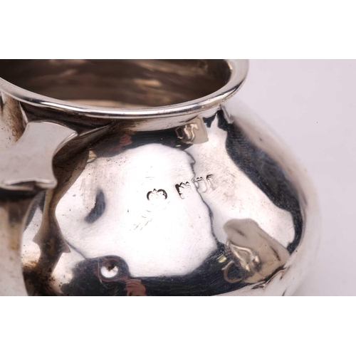 519 - A collection of silver items including silver salt in the form of a bird, a silver mounted pepper mi... 