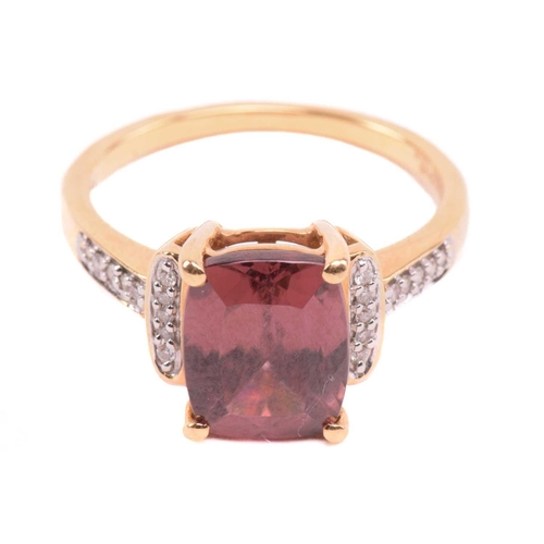 52 - A red zircon and diamond dress ring in 18ct yellow gold, centred with a cushion-cut red zircon in a ... 