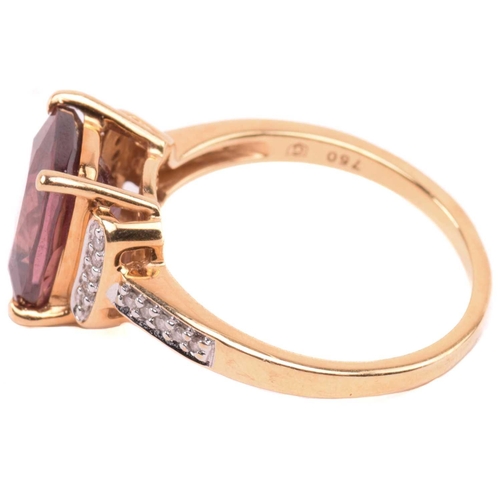 52 - A red zircon and diamond dress ring in 18ct yellow gold, centred with a cushion-cut red zircon in a ... 