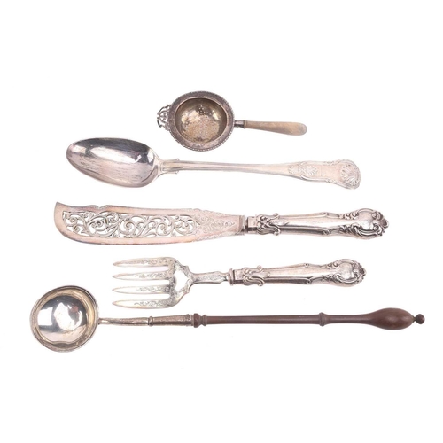 521 - A collection of assorted silver items comprising a Victorian Kings pattern serving spoon, a toddy la... 