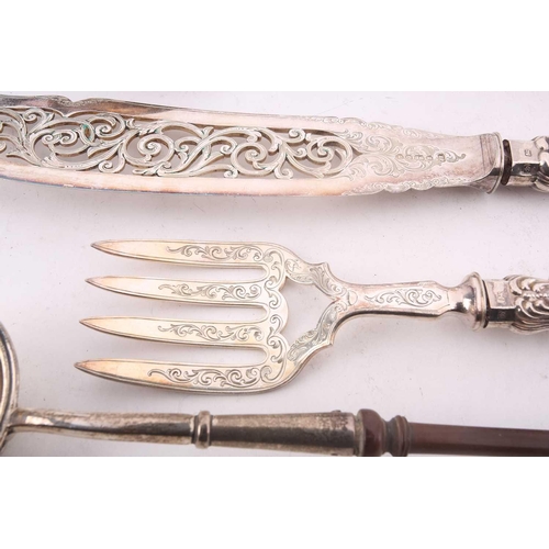 521 - A collection of assorted silver items comprising a Victorian Kings pattern serving spoon, a toddy la... 