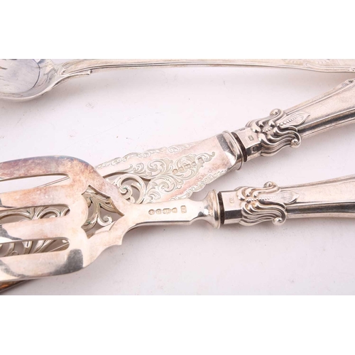 521 - A collection of assorted silver items comprising a Victorian Kings pattern serving spoon, a toddy la... 